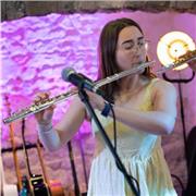 Music tutor providing lessons in piano and flute